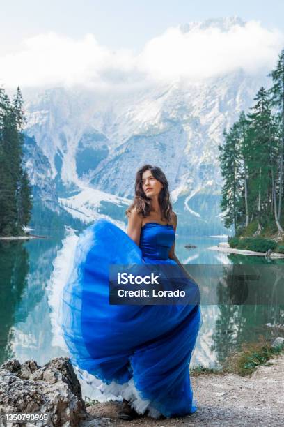 A Beautiful Brunette Princess At A Picturesque Lake Setting Stock Photo - Download Image Now
