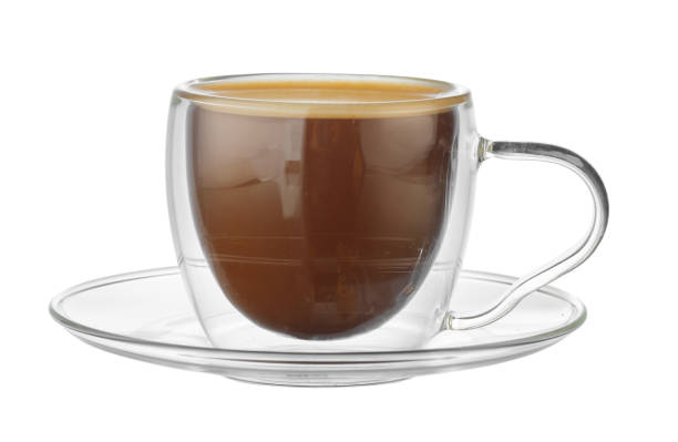 istock Glass cup of coffee isolated on white 1350795201