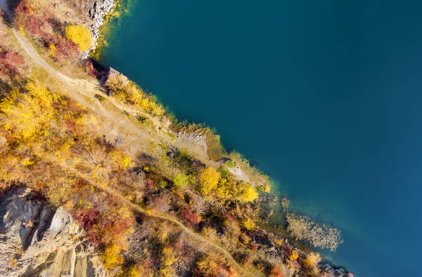 istock Panoramic top view quarry artificial lakes in autumn season 1350797209