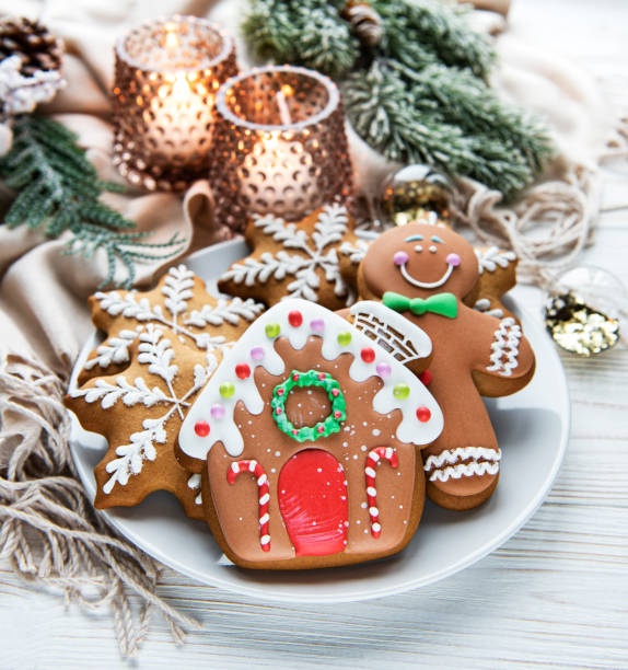istock Christmas gingerbread in the plate on white. Top view. 1350799179