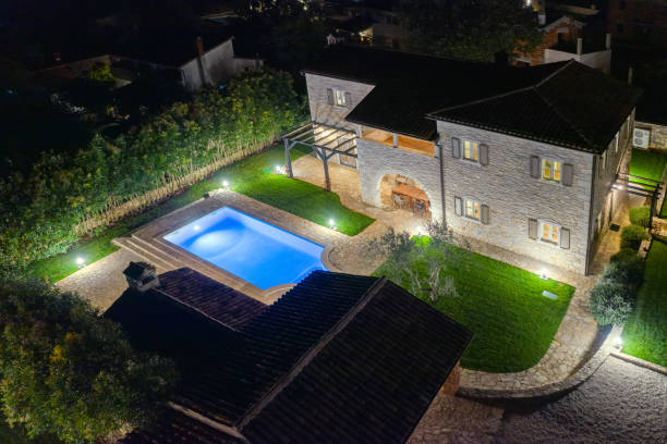 istock Luxurious beautiful modern villa with swimming pool and yard garden 1350800676