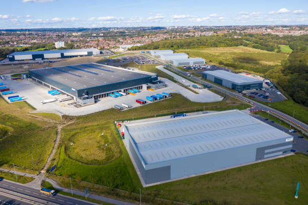 Aerial photo of the the Amazon distribution centre in the town of Leeds, West Yorkshire in the UK showing the centre and roads around the main building stock photo