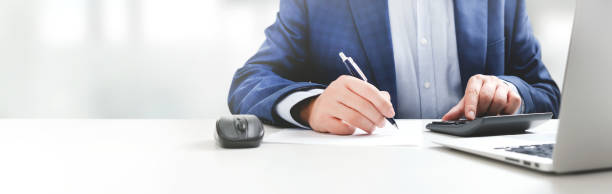 istock Businessman, accountant working in office 1350803969
