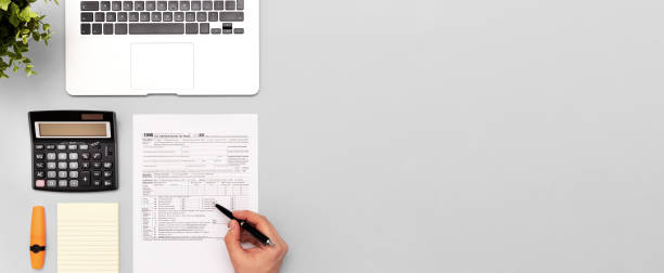 istock Tax income concept with US tax form 1350804328