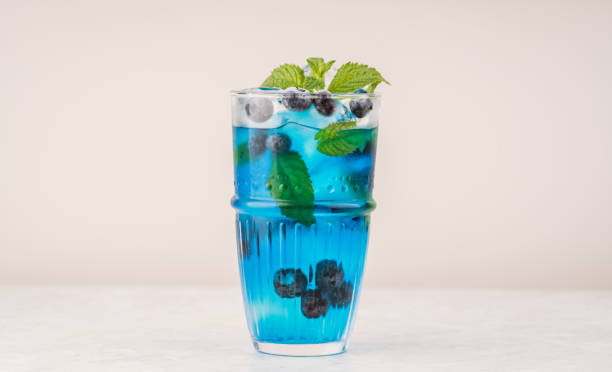 istock Tequila based blue cocktail with blueberry. Selective focus. Shallow depth of field. 1350806921