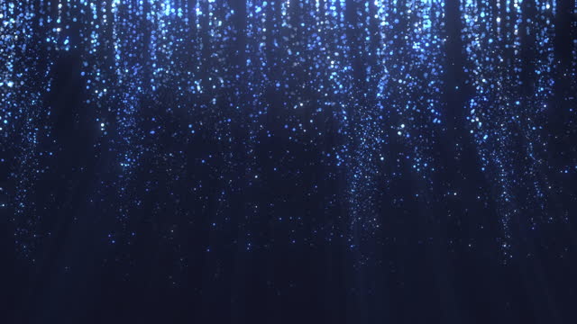 Loopable Glittering particles falling in slow motion - christmas, glamour, abstract falling particles background in blue