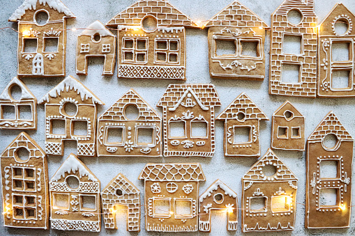 Homemade gingerbread houses with space for text. Traditional Christmas decoration. Christmas concept.
