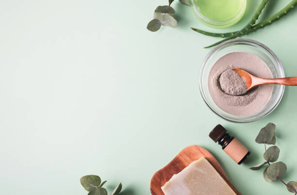 istock Natural cosmetics and ingredients on light green background. 1350815313