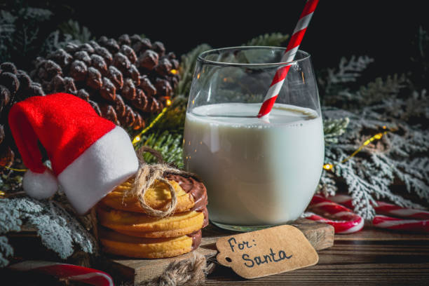 istock Cookie with milk on the table for Santa Claus 1350822837