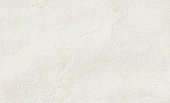 istock Seamless tileable vintage parchment paper texture background 1350825463