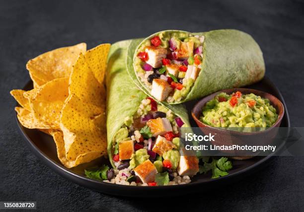 Chicken And Black Bean Burrito In A Spinach Tortilla Stock Photo - Download Image Now