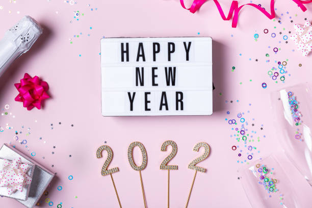 istock Happy New Year greeting card, 2022 with confetti and sparkles 1350828773