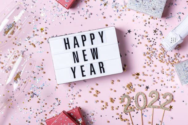 istock Happy New Year greeting card, 2022 with confetti and sparkles 1350829272