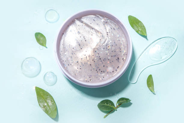 istock Cosmetic bottle with leaves with water 1350830178