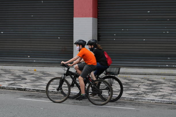 istock riding a bike 1350833371