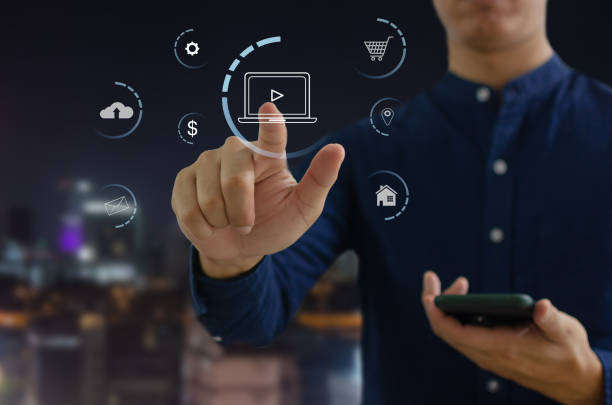 istock Hand touching digital virtual screen marketing concept icon business. 1350833761