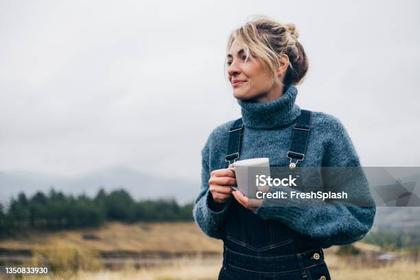Beautiful Woman Drinking Tea In Nature Stock Photo - Download Image Now - Women, One Woman Only, Happiness