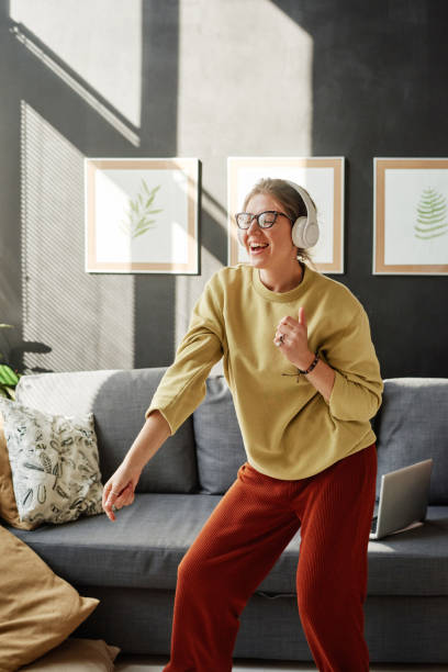 istock Woman having fun in the room 1350835417