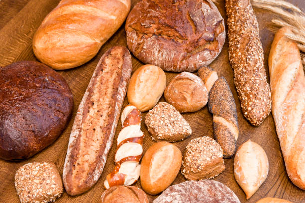 istock Delicious freshly baked bread and rolls assortment 1350836072