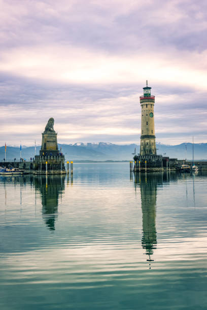 istock Harbour entrance with lighthouse 1350836224