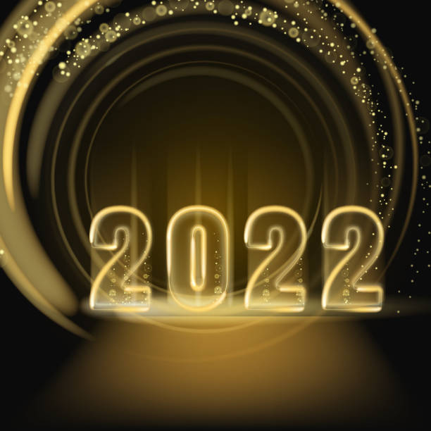 istock 2022 Happy New Year shiny gold color shiny numbers banner design template. Realistic text flash light, flow circle golden particles, glitter, sparkles dust, black background. Vector illustration greeting card 1350836505