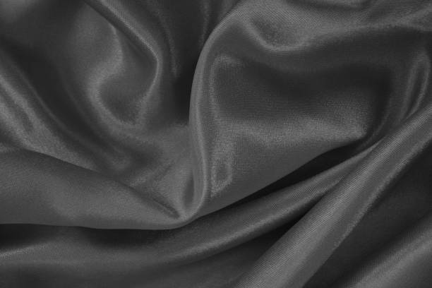 istock Dark grey fabric texture background, detail of silk or linen pattern. 1350841487