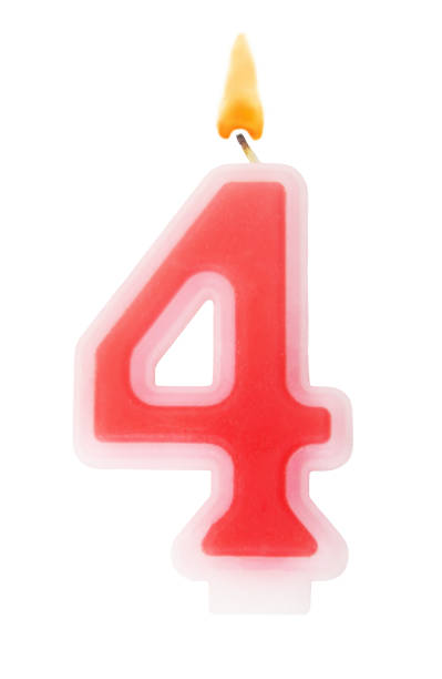 istock Red birthday candle isolated on white, number 4 1350845994