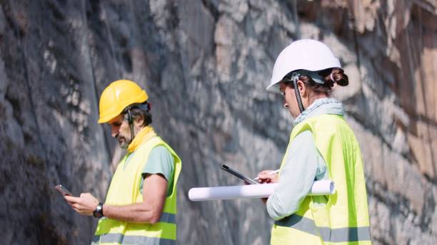 istock Road construction engineers working. Building new highways. 1350847987