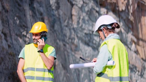 istock Road construction engineers working. Building new highways. 1350847988