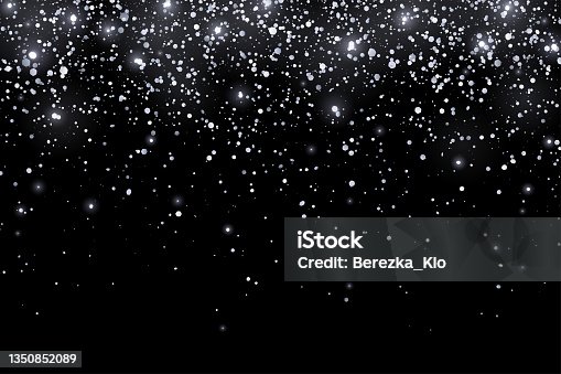 istock Silver glitter holiday confetti with glow lights on black background. Vector 1350852089