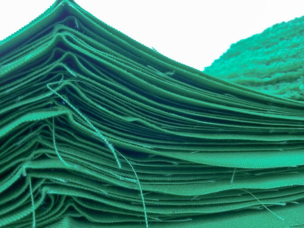 istock pile of green textile fabrics 1350853158
