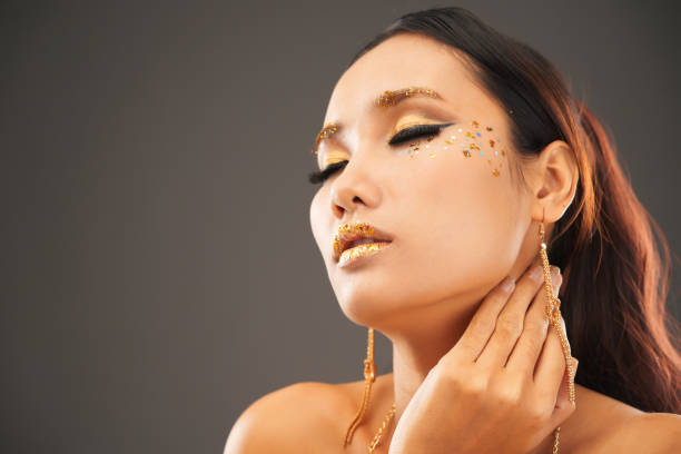 istock Sensual Woman with Golden Make-up 1350853187