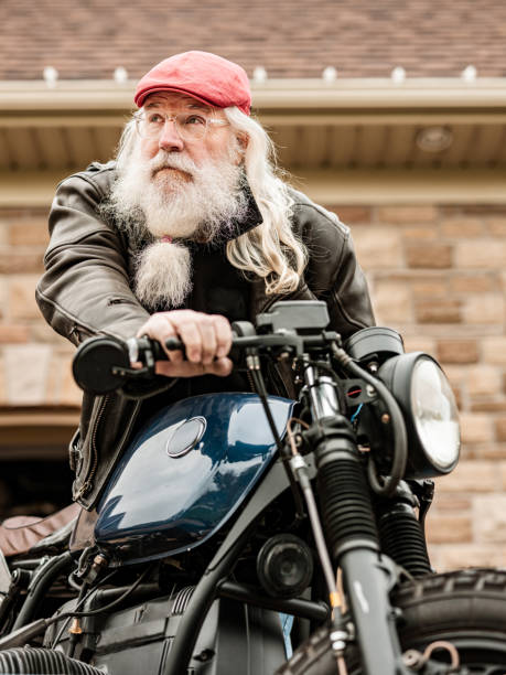 istock Senior man working on his motorcycle 1350853775