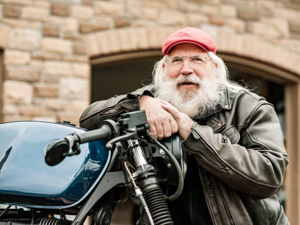istock Senior man working on his motorcycle 1350853777