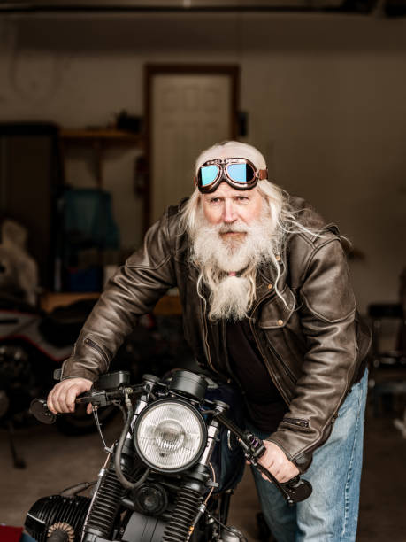 istock Senior man working on his motorcycle 1350853857