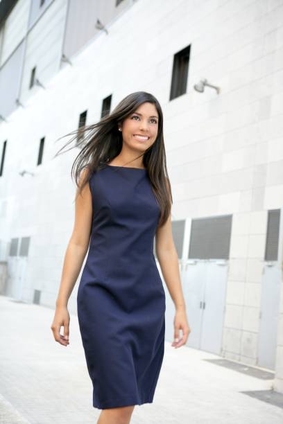 istock Beautiful stewardess walking to convention center 1350855009