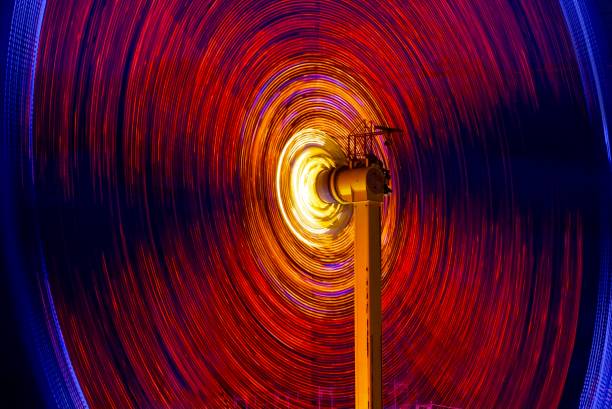 istock Carnival ride at night captured with long exposure 1350856538