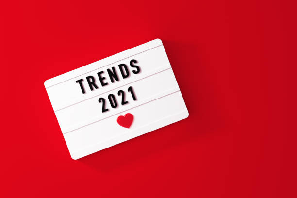 istock Trends 2021 Written White Lightbox Sitting On Red Background 1350856680