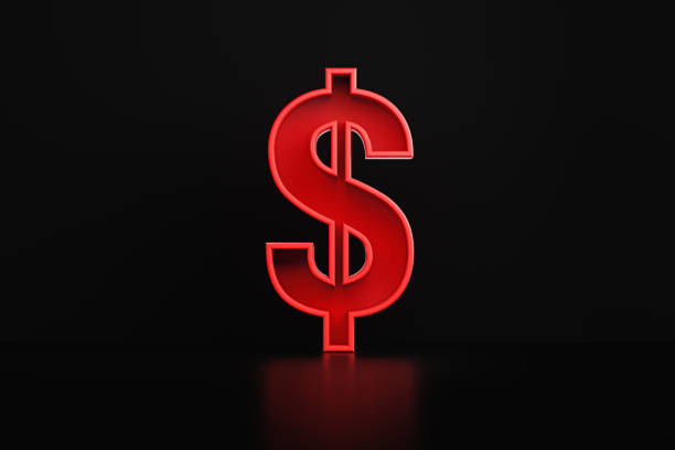 istock Red American Dollar Sign Sitting Before Black Background 1350857134