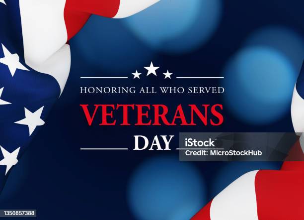 Veterans Day Concept Veterans Day Message Sitting Over Dark Blue Background Next To Rippled American Flag Stock Photo - Download Image Now