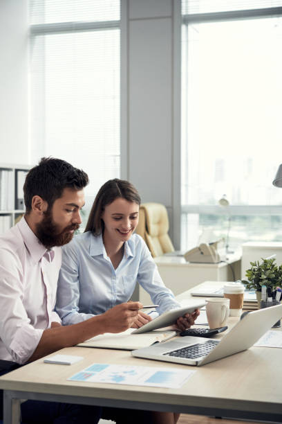 istock Team Of Managers Working On New Project 1350867992