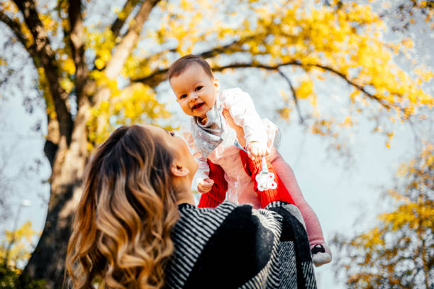 Cheerful mother with her little girl