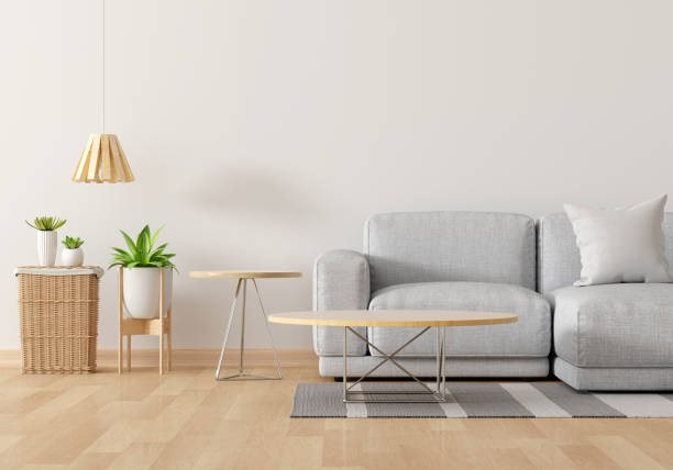 istock Gray sofa in white living room with blank table for mockup,3D rendering 1350871907