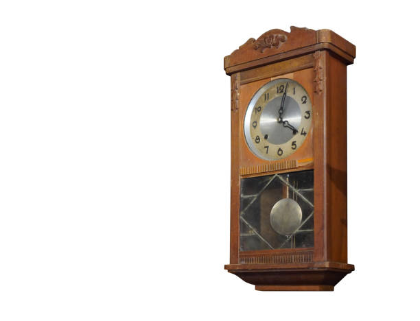 istock Di cut antique brown wooden wall clock on white background,object background, copy space 1350871986