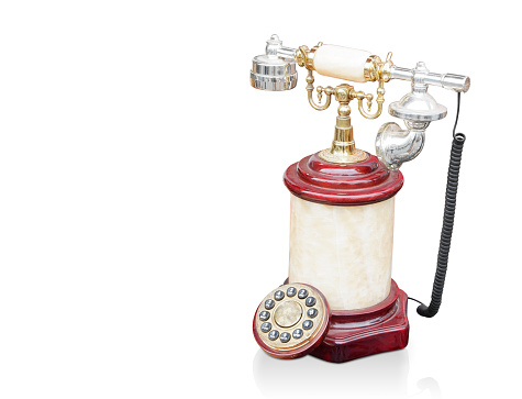 antique telephone on white background,copy space