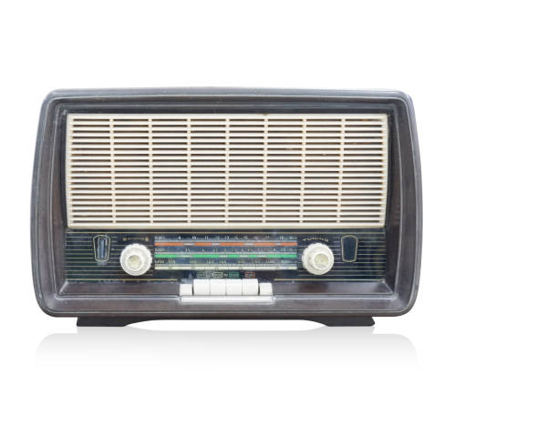 istock front view antique black and silver radio on wooden background,copy space 1350872247