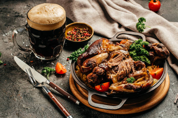 Roasted pork shank with cabbage salad, German cuisine, Beer Fest. banner, menu, recipe, place for text Roasted pork shank with cabbage salad, German cuisine, Beer Fest. banner, menu, recipe, place for text, pork hock stock pictures, royalty-free photos & images