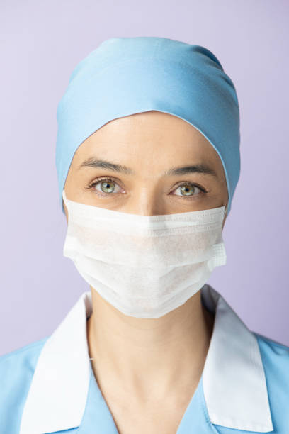 istock Masked Female Nurse 1350879463