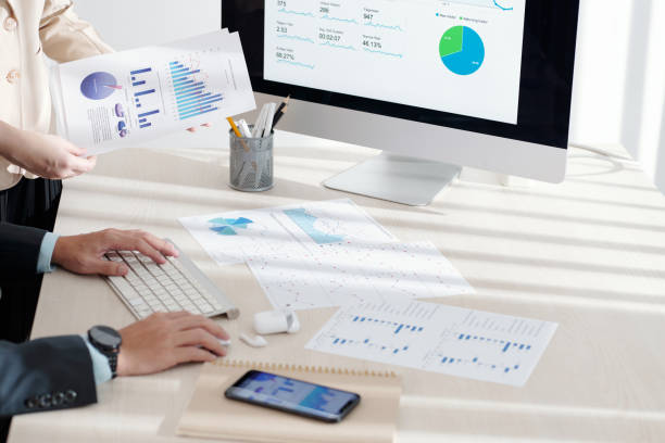 istock Business People Working with Charts 1350882199