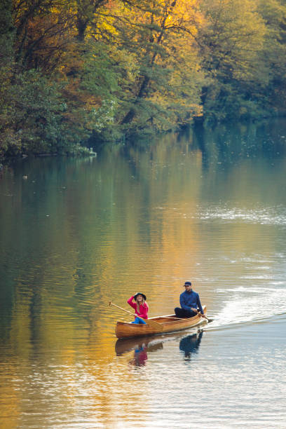 Moored boats in the autumn lake